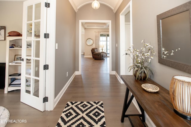 275 Hummingbird Dr, Vonore, TN 37885 - hallway featuring arched walkways, baseboards, and wood finished floors