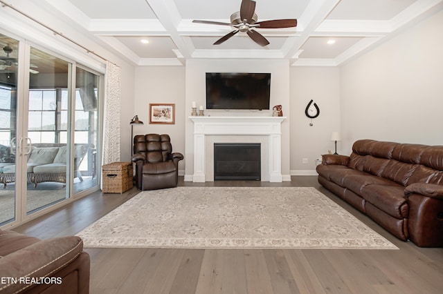 275 Hummingbird Dr, Vonore, TN 37885 - living area featuring beam ceiling, coffered ceiling, a glass covered fireplace, wood finished floors, and ceiling fan
