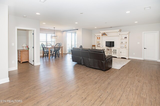 living room with light wood-type flooring