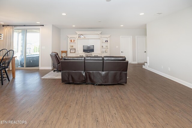 living room with hardwood / wood-style floors