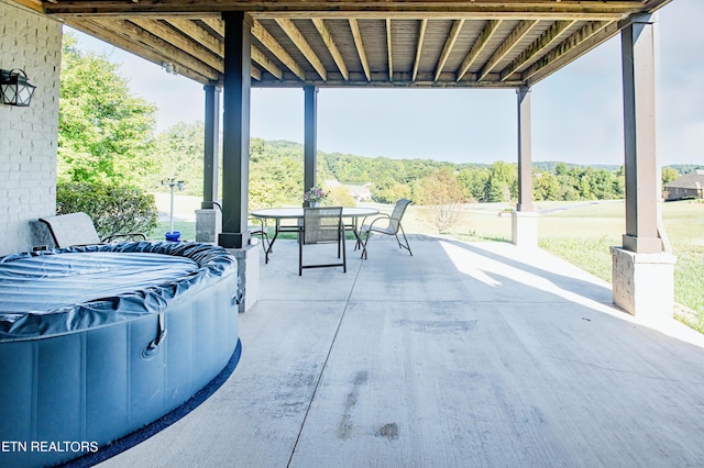 275 Hummingbird Dr, Vonore, TN 37885 - view of patio / terrace featuring a forest view and outdoor dining space
