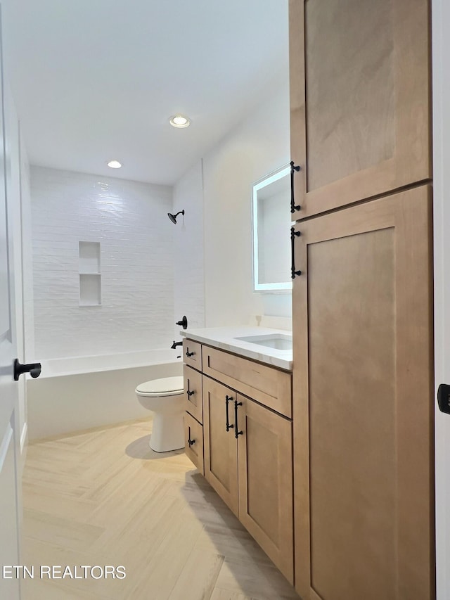 full bathroom featuring toilet, vanity, shower / bathtub combination, and recessed lighting