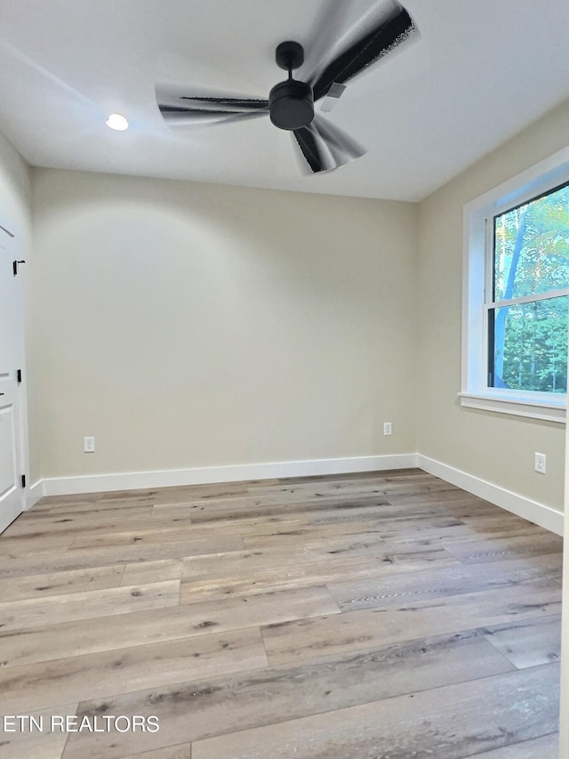 unfurnished room featuring baseboards, wood finished floors, recessed lighting, and a ceiling fan