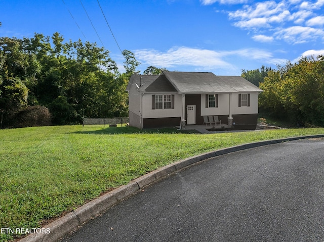 view of front of property with a front yard