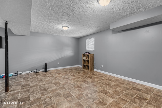 basement with a textured ceiling