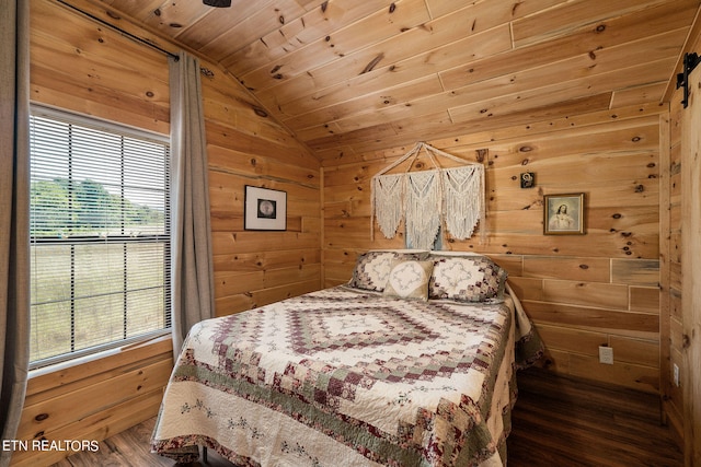 bedroom with wood ceiling, vaulted ceiling, dark hardwood / wood-style floors, and wooden walls