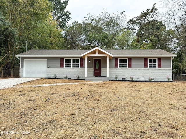 single story home featuring a garage