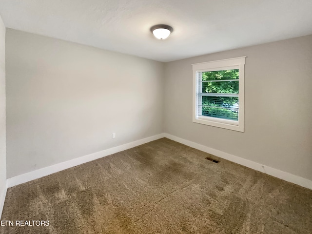 spare room with carpet flooring