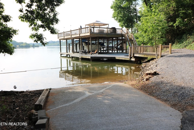 dock area with a deck with water view