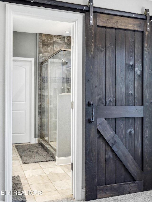 bathroom with a shower stall