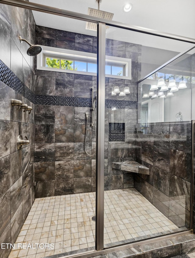bathroom with a shower stall