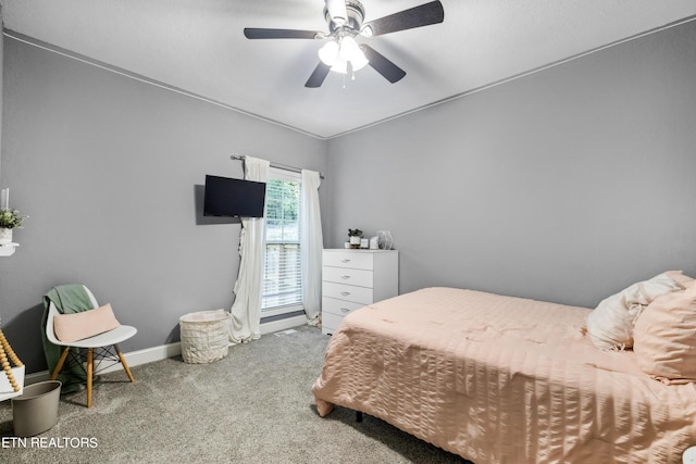 bedroom with carpet flooring, a ceiling fan, and baseboards