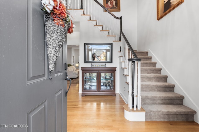 foyer with light hardwood / wood-style floors