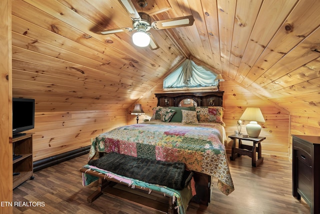 bedroom featuring vaulted ceiling, wood ceiling, wood-type flooring, wood walls, and ceiling fan