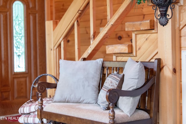 sitting room with wood walls