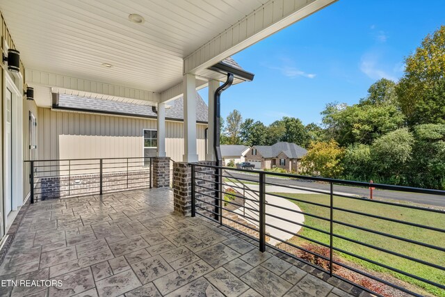 view of patio / terrace featuring a balcony