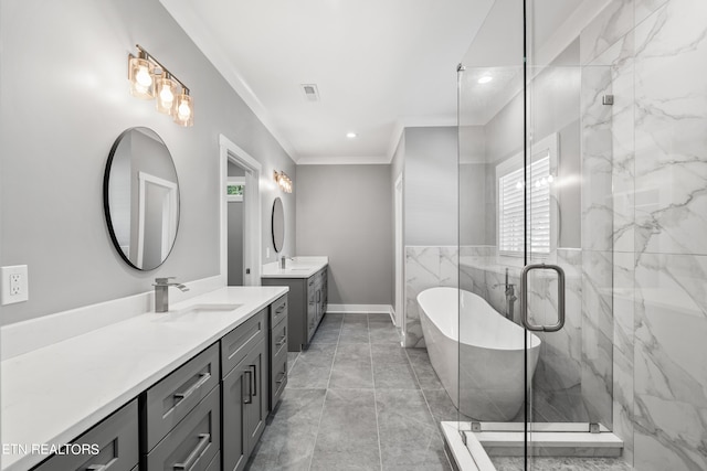 bathroom featuring vanity, crown molding, and separate shower and tub