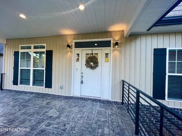 entrance to property featuring a patio area