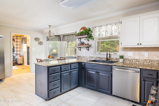 kitchen featuring a wealth of natural light, dishwasher, light stone countertops, and white cabinetry