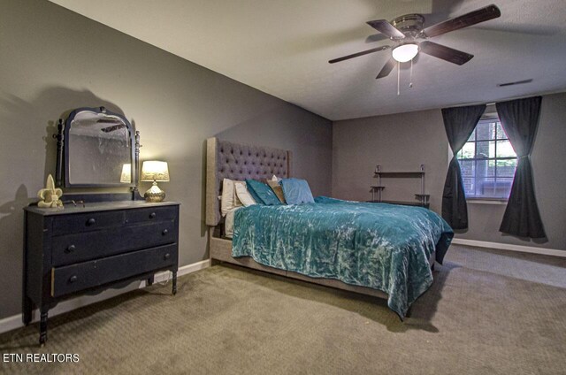 bedroom featuring light carpet and ceiling fan