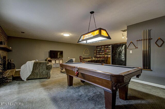 rec room featuring pool table, a brick fireplace, and carpet floors