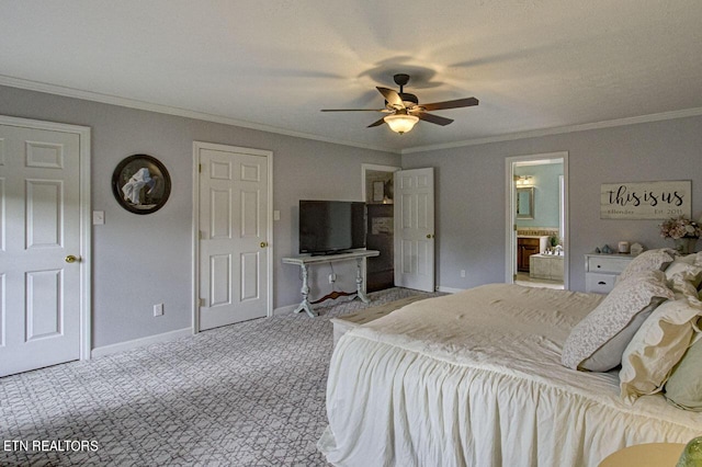 bedroom with a ceiling fan, connected bathroom, carpet floors, crown molding, and baseboards