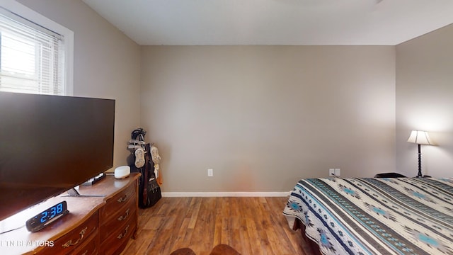 bedroom featuring hardwood / wood-style floors