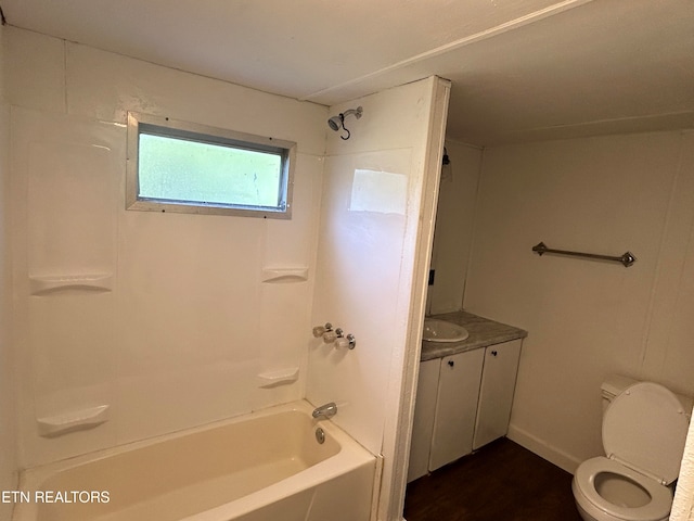 full bathroom featuring washtub / shower combination, toilet, and vanity