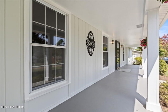 view of patio featuring a porch