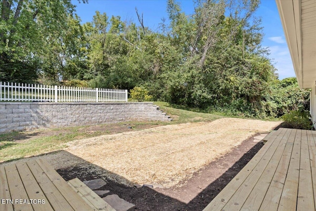 view of yard with a wooden deck