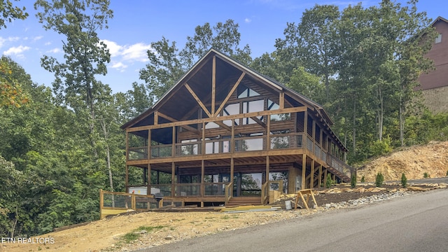 exterior space featuring a wooden deck