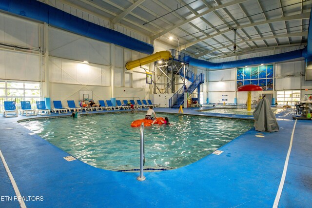 view of pool featuring a water slide