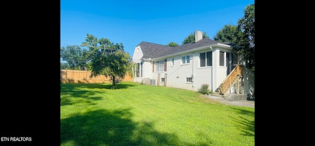 exterior space featuring a lawn