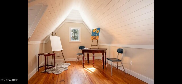 bonus room with wood ceiling, vaulted ceiling, and hardwood / wood-style floors