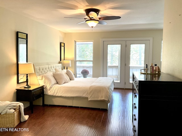 bedroom with access to outside, dark wood-style flooring, and ceiling fan