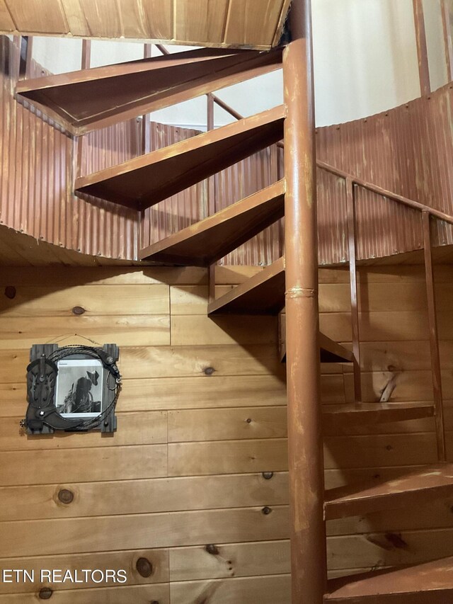 room details featuring wood walls