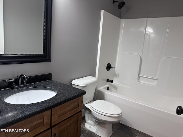 full bath featuring vanity, shower / bathing tub combination, toilet, and tile patterned flooring