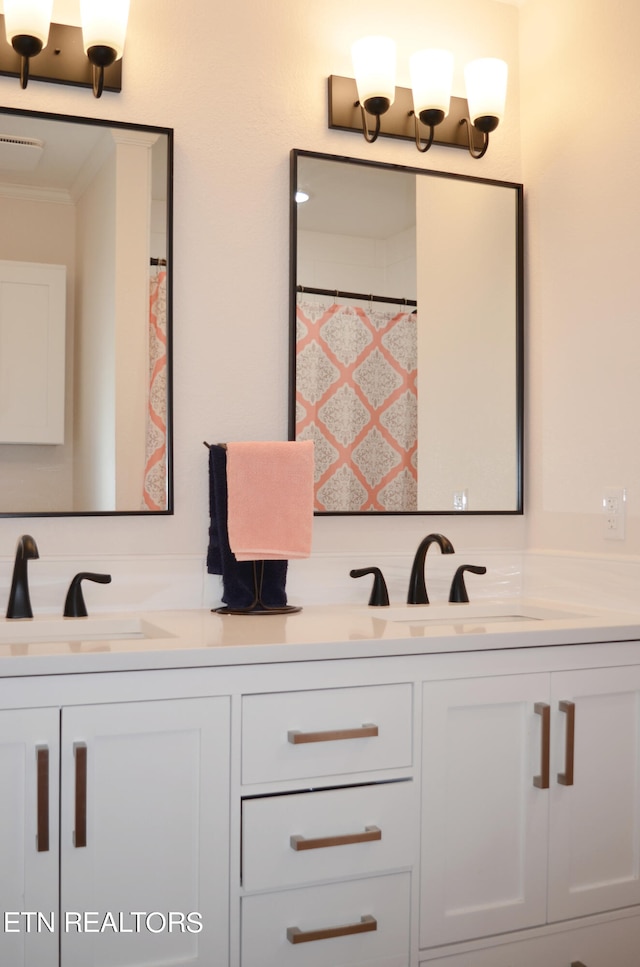 bathroom with vanity and a shower with shower curtain