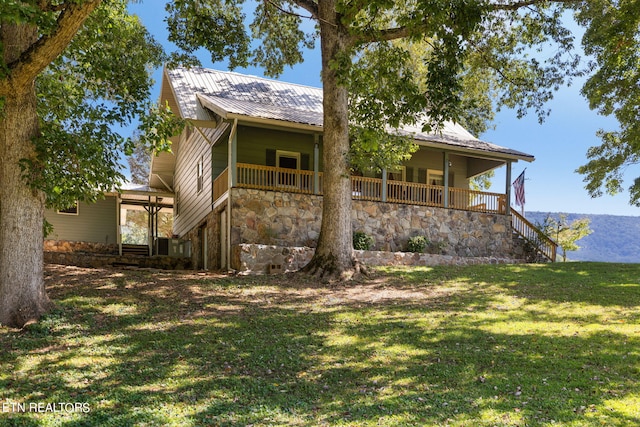 view of property exterior featuring a lawn