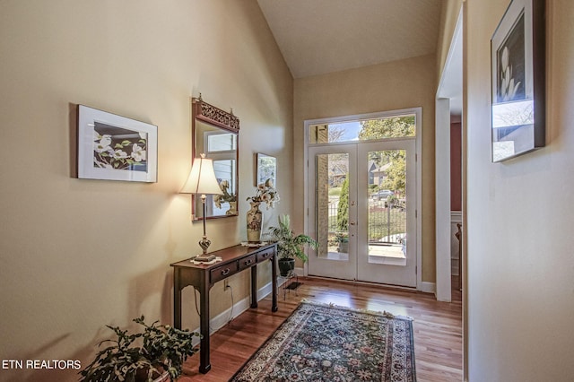 108 Waynoka Ln, Loudon, TN 37774 - entrance foyer with french doors, high vaulted ceiling, baseboards, and wood finished floors