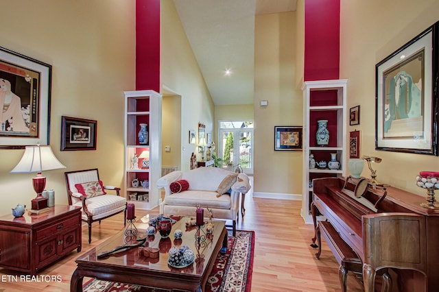 108 Waynoka Ln, Loudon, TN 37774 - living area with high vaulted ceiling, baseboards, and light wood-type flooring