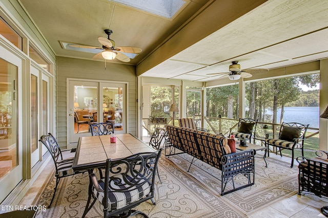 108 Waynoka Ln, Loudon, TN 37774 - sunroom / solarium with outdoor lounge area, a skylight, and a ceiling fan