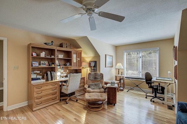 108 Waynoka Ln, Loudon, TN 37774 - home office with a ceiling fan, baseboards, light wood-style floors, and a textured ceiling