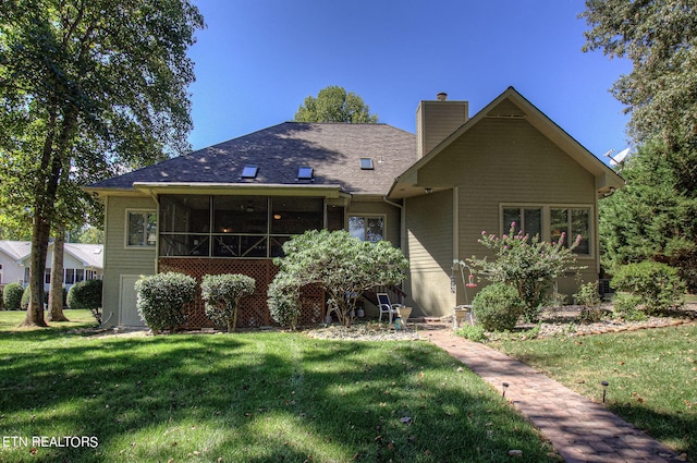108 Waynoka Ln, Loudon, TN 37774 - rear view of house with a chimney, a sunroom, and a lawn