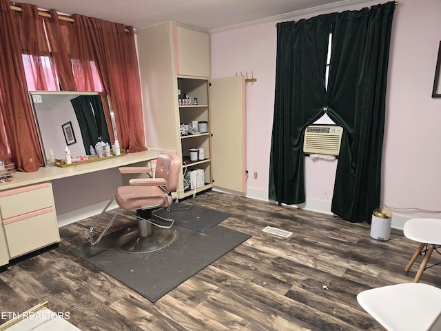 home office with ornamental molding and dark wood-type flooring