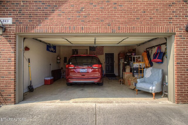 garage with a carport