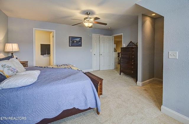 carpeted bedroom featuring ceiling fan