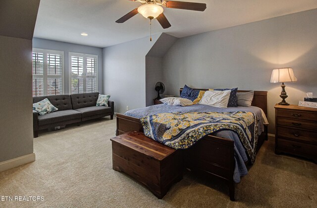 carpeted bedroom featuring ceiling fan