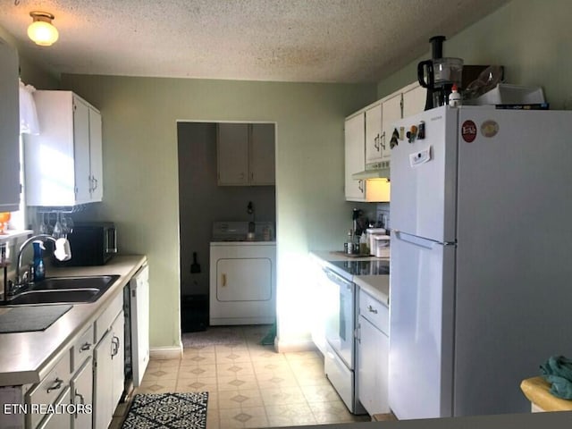 kitchen with white cabinets, white appliances, sink, washer / dryer, and a textured ceiling