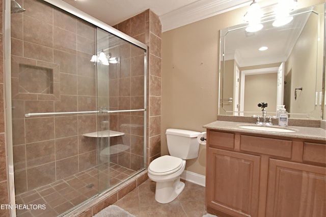 bathroom with vanity, a shower with shower door, toilet, ornamental molding, and tile patterned floors